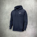 Nike Club Hoodie in midnight navy with white accents, featuring a classic design and soft fleece fabric for warmth and everyday comfort.