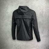 Nike Academy Rain Jacket in black, featuring a water-resistant design for comfort and protection in wet conditions.