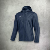 Nike Academy Rain Jacket in navy, featuring a water-resistant design for protection and comfort in wet conditions.