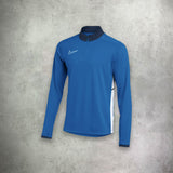 Nike Academy Drill Half Zip Top in royal blue, featuring a streamlined design with moisture-wicking fabric for performance and style