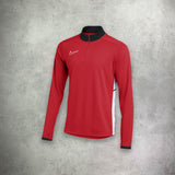 Nike Academy Drill Half in red, featuring a streamlined design with moisture-wicking fabric for performance and style.