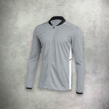 Nike Academy Drill Track Jacket in grey, featuring a lightweight, moisture-wicking design for a sleek and athletic look.