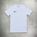 Nike Dri-Fit T-Shirt and Shorts Set in white and grey, featuring moisture-wicking fabric for comfort and a clean, athletic style.