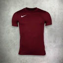 Nike Dri-Fit T-Shirt and Shorts Set in maroon red, featuring moisture-wicking fabric for comfort and a bold, athletic style.
