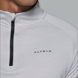 Altryn Tech Half Zip and Pant Cargo Tracksuit Set in grey and black, featuring a modern half-zip top and cargo pants for a stylish, performance-driven outfit.