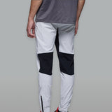 Altryn Seatallan Pant in grey and black, featuring a modern design with a comfortable fit, ideal for both athletic and casual wear.