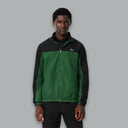 Lacoste Sport Printed Tracksuit in green and black, featuring a sleek design with a printed logo on the chest and matching track pants, perfect for athletic and casual wear.