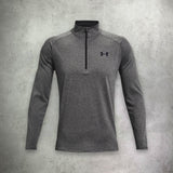 Under Armour Tech 2.0 Half Zip in carbon heather and black, featuring moisture-wicking fabric and a modern, athletic fit for performance and comfort.