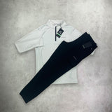 
Altryn Tech Half Zip and Pant Cargo Tracksuit Set in grey and black, featuring a modern half-zip top and cargo pants for a stylish, performance-driven outfit.