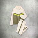 Lacoste Diamond Taffeta Tennis Tracksuit Set in khaki green, featuring a sporty jacket and matching pants designed for comfort and performance with a modern color palette.