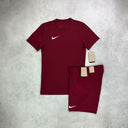 Nike Dri-Fit T-Shirt and Shorts Set in maroon red, featuring moisture-wicking fabric for comfort and a bold, athletic style.