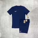 Nike Dri-Fit T-Shirt and Shorts Set in navy blue, featuring moisture-wicking fabric for comfort and a sleek athletic look.