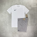 Nike Dri-Fit T-Shirt and Shorts Set in white and grey, featuring moisture-wicking fabric for comfort and a clean, athletic style.
