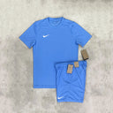 Nike Dri-Fit T-Shirt and Shorts Set in aqua blue, designed with moisture-wicking fabric for a fresh, athletic look and comfortable fit.